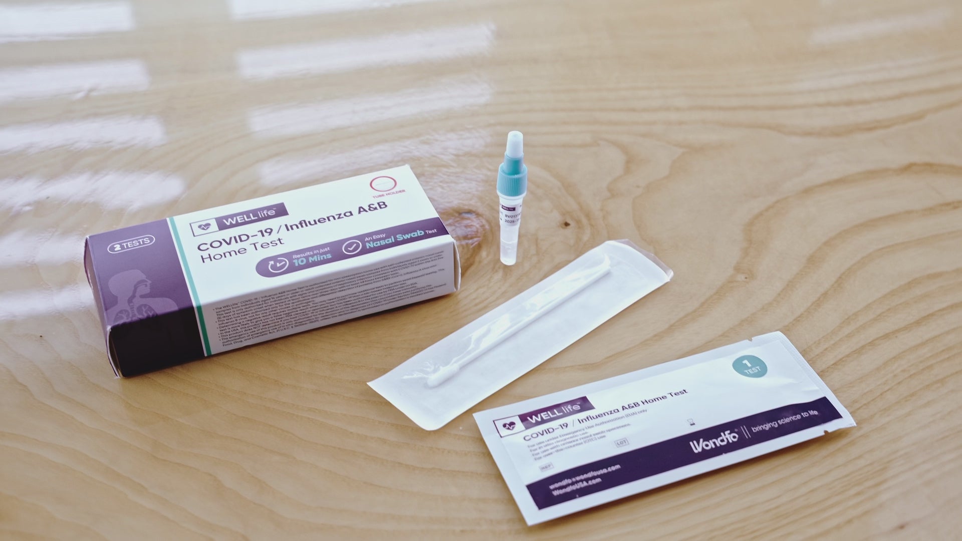 Cargar vídeo: Prueba de COVID y gripe A/B de WellLife 