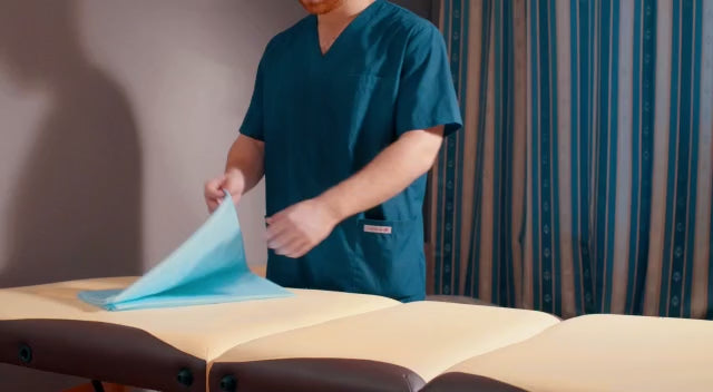 Load video: Disposable Sheets for Massage Tables